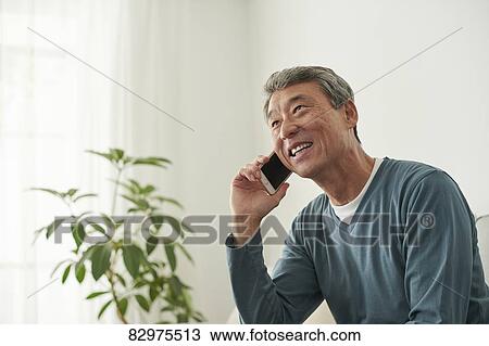 Japanese senior man on the sofa View Large Photo Image Stock Image - Japanese senior man on the sofa. Fotosearch