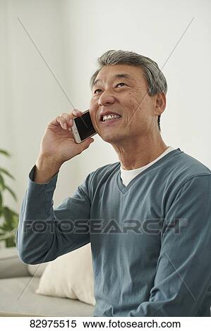 Japanese senior man on the sofa View Large Photo Image Stock Photography - Japanese senior man on the sofa. Fotosearch