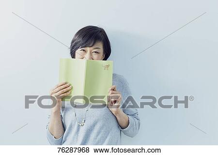 Japanese senior woman against white wall View Large Photo Image Stock Photo - Japanese senior woman against white wall. Fotosearch