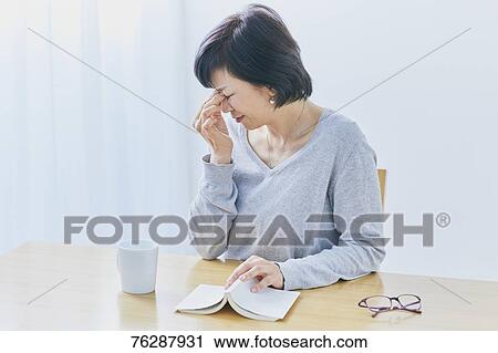 Japanese senior woman having headhache View Large Photo Image Stock Image - Japanese senior woman having headhache. Fotosearch