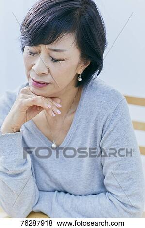 Japanese senior woman having headhache View Large Photo Image Stock Photo - Japanese senior woman having headhache. Fotosearch