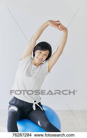 Picture - Japanese senior woman training. Fotosearch