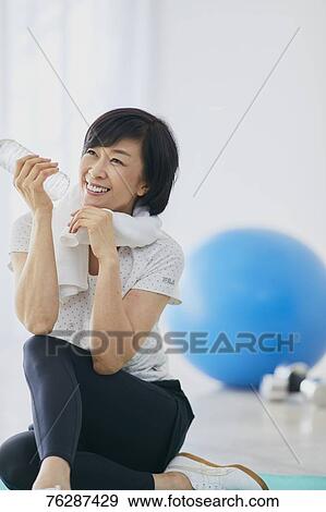 Stock Photo - Japanese senior woman training. Fotosearch