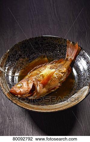 Stock Image - Japanese style boiled fish. Fotosearch