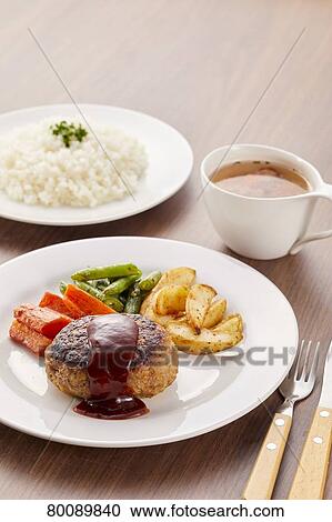 Stock Image - Japanese style burg steak. Fotosearch