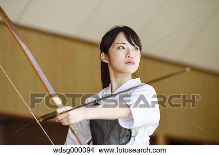 Picture - Japanese traditional archery athlete practicing. Fotosearch