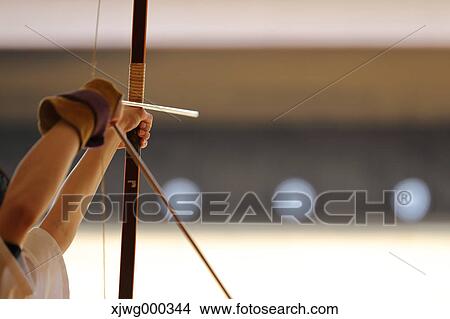 Japanese traditional archery athlete practicing View Large Photo Image Picture - Japanese traditional archery athlete practicing. Fotosearch