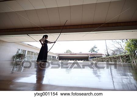 Japanese traditional archery athlete practicing View Large Photo Image Picture - Japanese traditional archery athlete practicing. Fotosearch