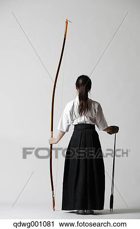 Japanese traditional archery athlete against white background View Large Photo Image Stock Image - Japanese traditional archery athlete against white background. Fotosearch