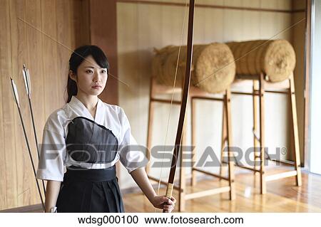 Japanese traditional archery athlete practicing View Large Photo Image Stock Image - Japanese traditional archery athlete practicing. Fotosearch