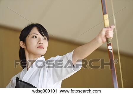 Japanese traditional archery athlete practicing View Large Photo Image Stock Image - Japanese traditional archery athlete practicing. Fotosearch