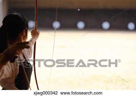 Japanese traditional archery athlete practicing View Large Photo Image Stock Image - Japanese traditional archery athlete practicing. Fotosearch