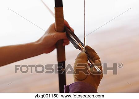 Japanese traditional archery athlete practicing View Large Photo Image Stock Image - Japanese traditional archery athlete practicing. Fotosearch
