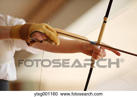 Japanese traditional archery athlete practicing View Large Photo Image Stock Image - Japanese traditional archery athlete practicing. Fotosearch
