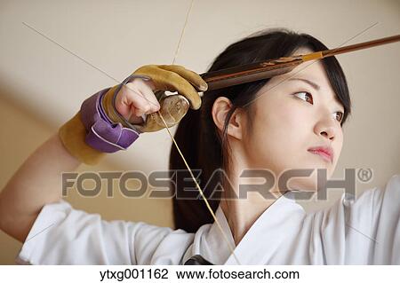 Japanese traditional archery athlete practicing View Large Photo Image Stock Image - Japanese traditional archery athlete practicing. Fotosearch
