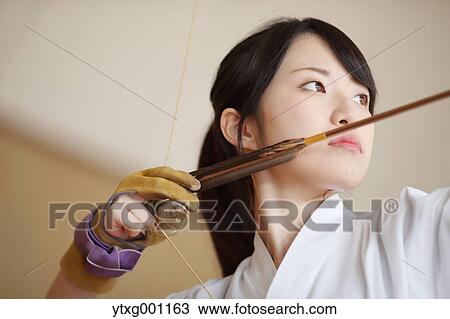 Japanese traditional archery athlete practicing View Large Photo Image Stock Image - Japanese traditional archery athlete practicing. Fotosearch