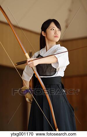 Japanese traditional archery athlete practicing View Large Photo Image Stock Image - Japanese traditional archery athlete practicing. Fotosearch