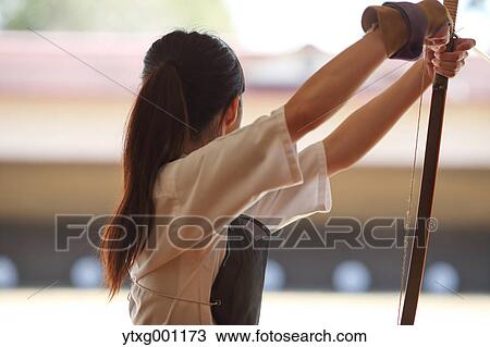 Japanese traditional archery athlete practicing View Large Photo Image Stock Image - Japanese traditional archery athlete practicing. Fotosearch