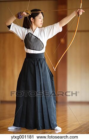 Japanese traditional archery athlete practicing View Large Photo Image Stock Image - Japanese traditional archery athlete practicing. Fotosearch