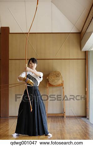 Japanese traditional archery athlete practicing View Large Photo Image Stock Photo - Japanese traditional archery athlete practicing. Fotosearch
