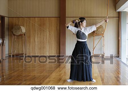 Japanese traditional archery athlete practicing View Large Photo Image Stock Photo - Japanese traditional archery athlete practicing. Fotosearch