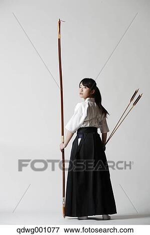 Japanese traditional archery athlete against white background View Large Photo Image Stock Photo - Japanese traditional archery athlete against white background. Fotosearch