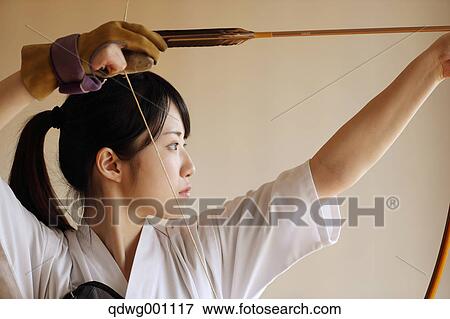 Japanese traditional archery athlete practicing View Large Photo Image Stock Photo - Japanese traditional archery athlete practicing. Fotosearch