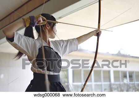 Japanese traditional archery athlete practicing View Large Photo Image Stock Photo - Japanese traditional archery athlete practicing. Fotosearch
