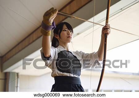 Japanese traditional archery athlete practicing View Large Photo Image Stock Photo - Japanese traditional archery athlete practicing. Fotosearch