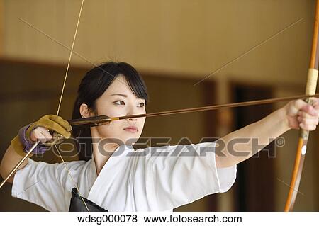 Japanese traditional archery athlete practicing View Large Photo Image Stock Photo - Japanese traditional archery athlete practicing. Fotosearch