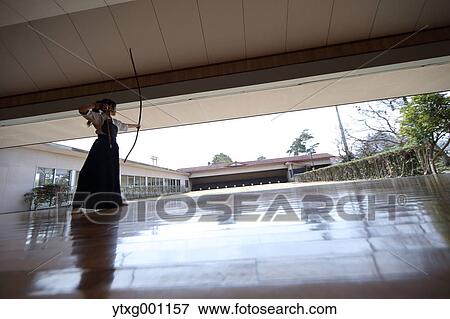 Japanese traditional archery athlete practicing View Large Photo Image Stock Photo - Japanese traditional archery athlete practicing. Fotosearch