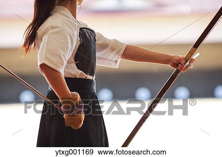 Japanese traditional archery athlete practicing View Large Photo Image Stock Photo - Japanese traditional archery athlete practicing. Fotosearch