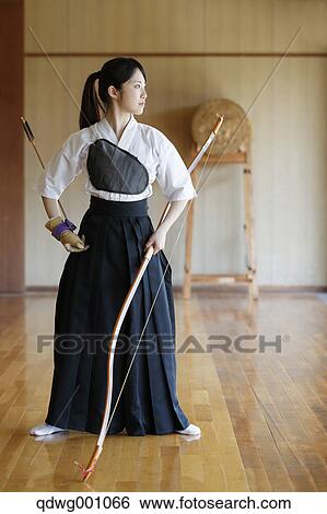 Stock Photograph - Japanese traditional archery athlete practicing. Fotosearch