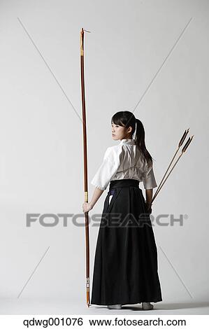 Japanese traditional archery athlete against white background View Large Photo Image Stock Photograph - Japanese traditional archery athlete against white background. Fotosearch