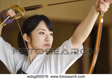 Japanese traditional archery athlete practicing View Large Photo Image Stock Photograph - Japanese traditional archery athlete practicing. Fotosearch
