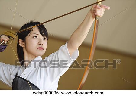 Japanese traditional archery athlete practicing View Large Photo Image Stock Photograph - Japanese traditional archery athlete practicing. Fotosearch