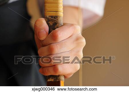 Japanese traditional archery athlete hand holding bow View Large Photo Image Stock Photograph - Japanese traditional archery athlete hand holding bow. Fotosearch