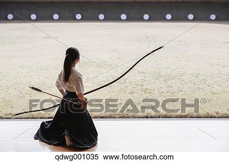 Stock Photography - Japanese traditional archery athlete practicing. Fotosearch