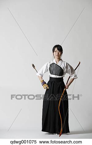 Japanese traditional archery athlete against white background View Large Photo Image Stock Photography - Japanese traditional archery athlete against white background. Fotosearch