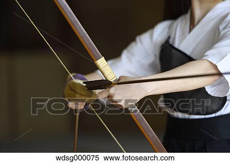 Stock Photography - Japanese traditional archery athlete practicing. Fotosearch
