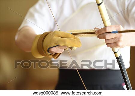 Japanese traditional archery athlete practicing View Large Photo Image Stock Photography - Japanese traditional archery athlete practicing. Fotosearch