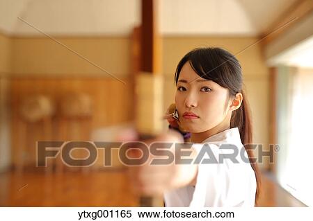 Japanese traditional archery athlete practicing View Large Photo Image Stock Photography - Japanese traditional archery athlete practicing. Fotosearch