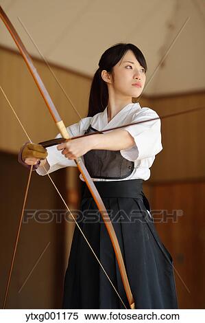 Japanese traditional archery athlete practicing View Large Photo Image Stock Photography - Japanese traditional archery athlete practicing. Fotosearch