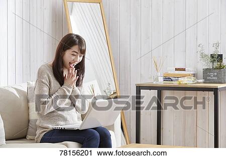 Japanese woman buying online View Large Photo Image Stock Image - Japanese woman buying online. Fotosearch