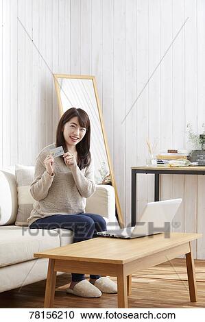 Japanese woman buying online View Large Photo Image Stock Image - Japanese woman buying online. Fotosearch