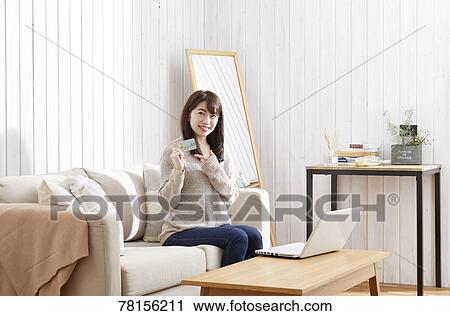 Japanese woman buying online View Large Photo Image Stock Image - Japanese woman buying online. Fotosearch