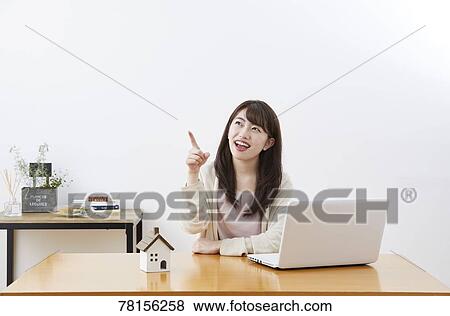 Japanese woman buying online View Large Photo Image Stock Photo - Japanese woman buying online. Fotosearch