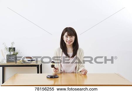 Stock Photography - Japanese woman buying online. Fotosearch