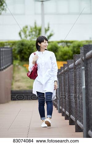 Japanese woman downtown Tokyo View Large Photo Image Picture - Japanese woman downtown Tokyo. Fotosearch