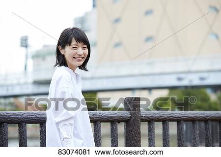 Japanese woman downtown Tokyo View Large Photo Image Stock Image - Japanese woman downtown Tokyo. Fotosearch